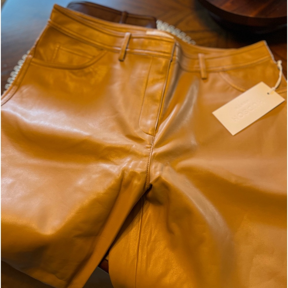 Faux leather tan ankle length or cropped pants.   Size 12 fits more 8 to 10